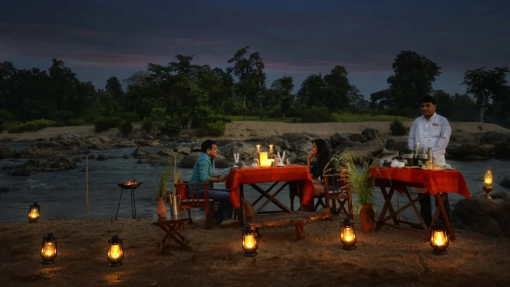Outdoor dining experience at Kanha Earth Lodge near Kanha National Park