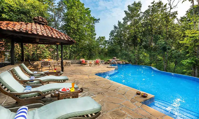 resort in kanha with a swimming pool